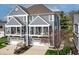 Charming two-story townhouse with private balconies and attached garages, set in a well-maintained community at 9769 Marina Village Dr, Indianapolis, IN 46256