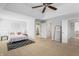 Expansive main bedroom with stylish decor, walk-in closet, and ensuite bathroom at 9769 Marina Village Dr, Indianapolis, IN 46256