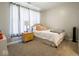 Cozy bedroom with soft carpet, a comfortable bed, and light-filtering curtains for a relaxing space at 9831 N Port Dr, McCordsville, IN 46055