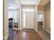 Welcoming foyer with hardwood floors and views into the office and living spaces at 9831 N Port Dr, McCordsville, IN 46055
