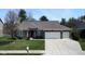 View of the front exterior with manicured lawn and two car garage at 9831 N Port Dr, McCordsville, IN 46055