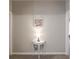 Cozy hallway displaying a decorative picture and a charming lamp on an accent table at 9831 N Port Dr, McCordsville, IN 46055