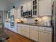 This kitchen features granite countertops, stainless steel appliances, and white cabinets at 9831 N Port Dr, McCordsville, IN 46055