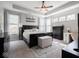 Spacious main bedroom featuring a tray ceiling, a ceiling fan and lots of natural light at 9831 N Port Dr, McCordsville, IN 46055