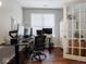 This well-lit office features dual monitors, modern furnishings, and a comfortable workspace at 9831 N Port Dr, McCordsville, IN 46055