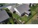 Aerial view of home with fenced backyard, screened in porch and manicured lawn at 9831 N Port Dr, McCordsville, IN 46055