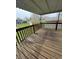 Wooden back deck overlooking backyard at 1010 Pamela Dr, Plainfield, IN 46168
