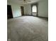A large bedroom with a window and ceiling fan at 1010 Pamela Dr, Plainfield, IN 46168