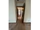 A hallway with multiple doors, leading to other rooms in the home at 1010 Pamela Dr, Plainfield, IN 46168