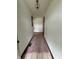 A hallway with multiple doors, leading to other rooms in the home at 1010 Pamela Dr, Plainfield, IN 46168