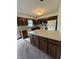 This kitchen features an island with storage and modern appliances at 1010 Pamela Dr, Plainfield, IN 46168