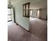 A spacious living room featuring three large windows at 1010 Pamela Dr, Plainfield, IN 46168