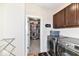 Convenient laundry room with washer, dryer, and easy access to the spacious walk-in closet at 10151 E 191St St, Noblesville, IN 46060