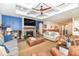 Warm living room features coffered ceilings, cozy fireplace, hardwood floors and a blue accent wall at 10151 E 191St St, Noblesville, IN 46060