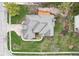 Birds-eye view of a well manicured lawn and a home with gray roof shingles at 10157 Woods Edge Dr, Fishers, IN 46037