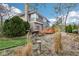 This backyard offers mature trees, wooden deck, manicured lawn, and lush landscaping for outdoor enjoyment at 10157 Woods Edge Dr, Fishers, IN 46037