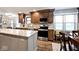 Well-appointed kitchen with stainless steel appliances, granite counters and wood floors at 10234 Leeward Blvd, Indianapolis, IN 46256