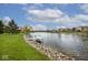 Scenic lakefront view with a dock, perfect for boating, fishing, and enjoying tranquil waterfront living at 10234 Leeward Blvd, Indianapolis, IN 46256