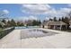 Outdoor pool area with a secure cover, alongside a cabana, promising a relaxing and private experience at 10234 Leeward Blvd, Indianapolis, IN 46256