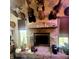 Stone fireplace featuring unique decor at 1024 Foltz St, Indianapolis, IN 46241