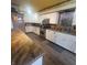 Bright kitchen with white cabinets, and stainless steel appliances, offering ample counter space at 1024 Foltz St, Indianapolis, IN 46241