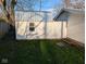 Side view of a detached shed with white siding at 1024 Foltz St, Indianapolis, IN 46241
