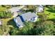 An elevated perspective displaying a home's roof, backyard features and landscape within a tranquil setting at 10401 Monarch Ct, Noblesville, IN 46060