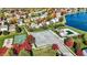 A bird's eye view of community amenities including a pool, park, sports court, and surrounding residential area at 10401 Monarch Ct, Noblesville, IN 46060