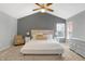 Spacious main bedroom with neutral colors, vaulted ceiling, and lots of natural light at 10401 Monarch Ct, Noblesville, IN 46060