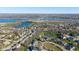 Beautiful neighborhood featuring well-maintained homes, lush greenery, and a tranquil pond with fountain at 10611 Proposal Pointe Way, Fishers, IN 46040