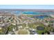 Stunning aerial view of a lakeside neighborhood with a mix of single-Gathering homes and waterfront access at 10611 Proposal Pointe Way, Fishers, IN 46040