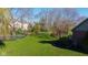 Well-manicured lawn and garden areas create a serene and inviting outdoor space perfect for entertaining at 10611 Proposal Pointe Way, Fishers, IN 46040
