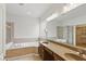 Spacious bathroom featuring dual sinks, large soaking tub and shower at 10611 Proposal Pointe Way, Fishers, IN 46040