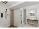 Modern bathroom showcasing a stylish walk-in shower and floating vanity with vessel sink at 10611 Proposal Pointe Way, Fishers, IN 46040
