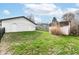 Large backyard featuring a shed and fencing with green grass at 107 Northwood Dr, Fishers, IN 46038