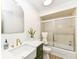 Bright bathroom with modern fixtures, shower, and neutral colors at 107 Northwood Dr, Fishers, IN 46038