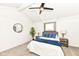 Cozy bedroom with vaulted ceiling, ceiling fan, neutral tones, and comfortable furnishings at 107 Northwood Dr, Fishers, IN 46038