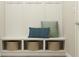 Entryway features a built-in bench with storage baskets, pillows, and hooks at 11683 Aubrey Ln, Fishers, IN 46040