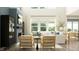 Elegant living room with a fireplace, comfortable seating, modern decor, and ample natural light at 11683 Aubrey Ln, Fishers, IN 46040