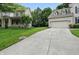 Charming home with a brick exterior, a two-car garage and a lush green lawn at 11974 Volcanic Rock Dr, Fishers, IN 46037