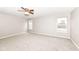 Spacious bedroom with ceiling fan, neutral walls and carpeted floor at 12455 Deerview Dr, Noblesville, IN 46060