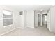 Bright bedroom with a large window, neutral walls, and carpeted floor at 12455 Deerview Dr, Noblesville, IN 46060