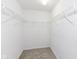 Walk-in closet featuring white walls, carpet, and wire shelving on two walls to maximize storage at 12455 Deerview Dr, Noblesville, IN 46060