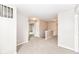 Hallway with neutral walls and carpeted floor leading to multiple rooms at 12455 Deerview Dr, Noblesville, IN 46060