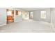 Open-concept living room flows into the kitchen and has plenty of natural light at 12455 Deerview Dr, Noblesville, IN 46060