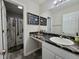 Stylish bathroom features a sleek sink, patterned shower curtain, and modern decor, creating a spa-like feel at 1336 Danielle Rd, Lebanon, IN 46052