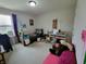 Inviting bedroom filled with natural light, a cozy bed, and a keyboard setup for music enthusiasts at 1336 Danielle Rd, Lebanon, IN 46052