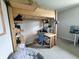 Creative bedroom space featuring a unique loft bed with built-in desk and workspace, maximizing functionality at 1336 Danielle Rd, Lebanon, IN 46052