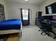 Well-organized bedroom featuring a comfortable bed, sleek desk setup, and modern decor for work or relaxation at 1336 Danielle Rd, Lebanon, IN 46052