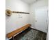 Inviting entryway with coat rack, bench, and welcome home decor, perfect for organizing your belongings at 1336 Danielle Rd, Lebanon, IN 46052